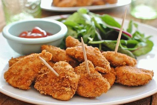 Fotografija piščančjih nuggets doma