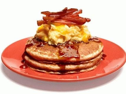 Fotografija polnozrnate fritters z umešanimi jajci in slanino